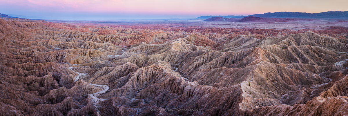 A panorama of the badlands in Anza Borrego during twilight.